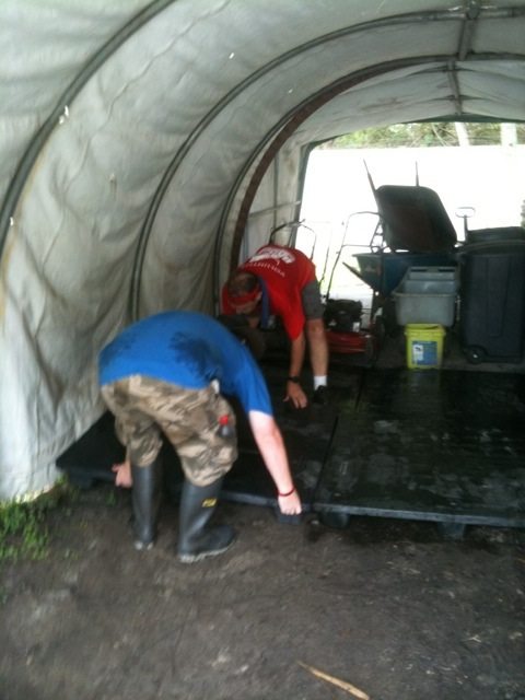Callum and Kev Raising Floor in Bucket Shed