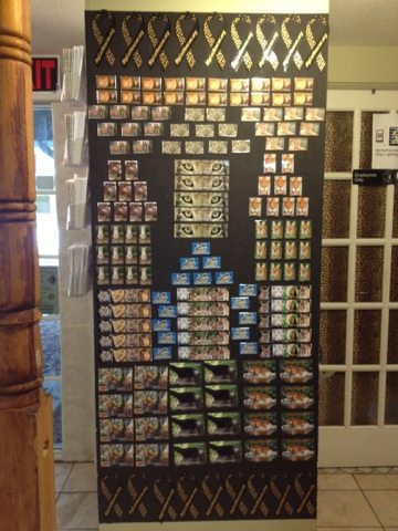 Partner Volunteers create a lovely display of magnets in the gift shop