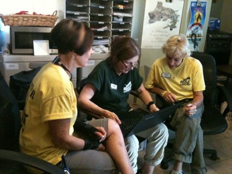 Diana, Pamela and Phyllis working in the customer service area of Big Cat Rescue