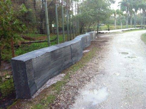 New section of memorial wall in front of tigers serves as barricade