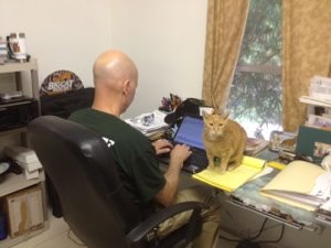 Jeff helping Tigger with his facebook page