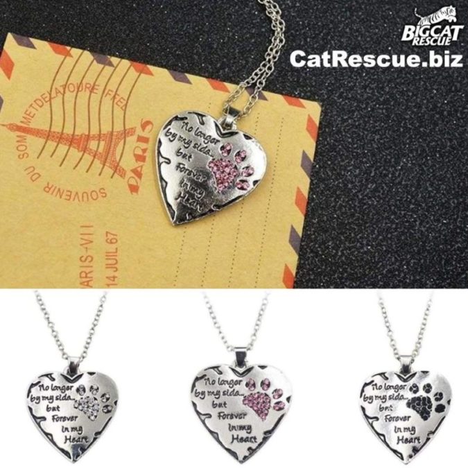 Shop CatRescue.biz and Fund the Freedom Fight with every purr-chase! Proceeds from this site help us with legislative efforts to create better laws to protect Big Cats! Remember your beloved cat when you wear this beautiful paw heart remembrance necklace "No longer by my side but forever in my heart". https://catrescue.myshopify.com/products/no-longer-be-my-side-but-forever-in-my-heart-pink-white-silver-crystal-cat-paws-print-heart-necklace